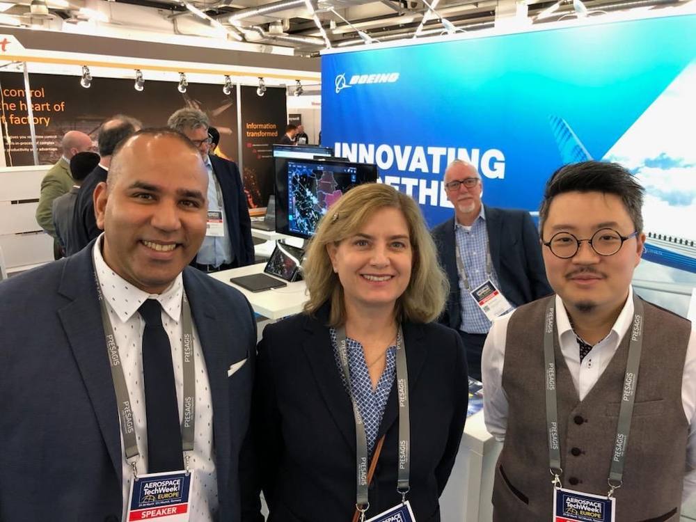 With colleagues at an industry event